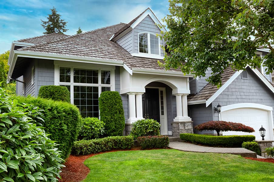 home with cedar shingle roof.