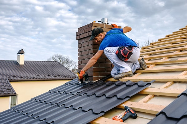 Master roofer installing a new roof.